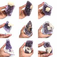 Cristalli di ametista con punti di calcite