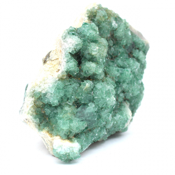 Cristalli di fluorite verde grezzo su ganga
