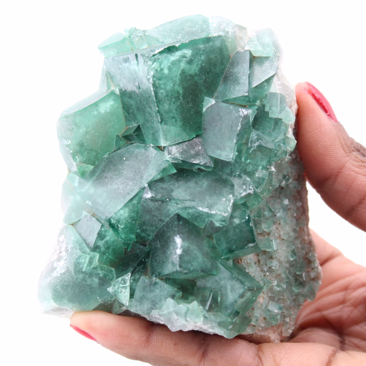 Cristalli cubici di fluorite verde su fluorite massiccia
