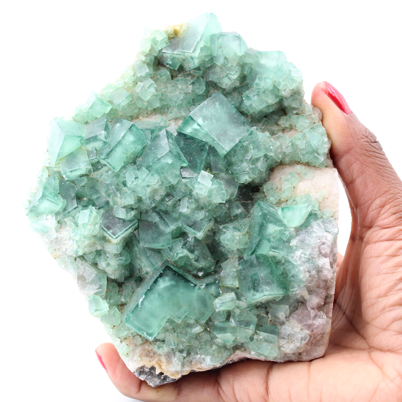 Cristalli cubici di fluorite verde su fluorite massiccia