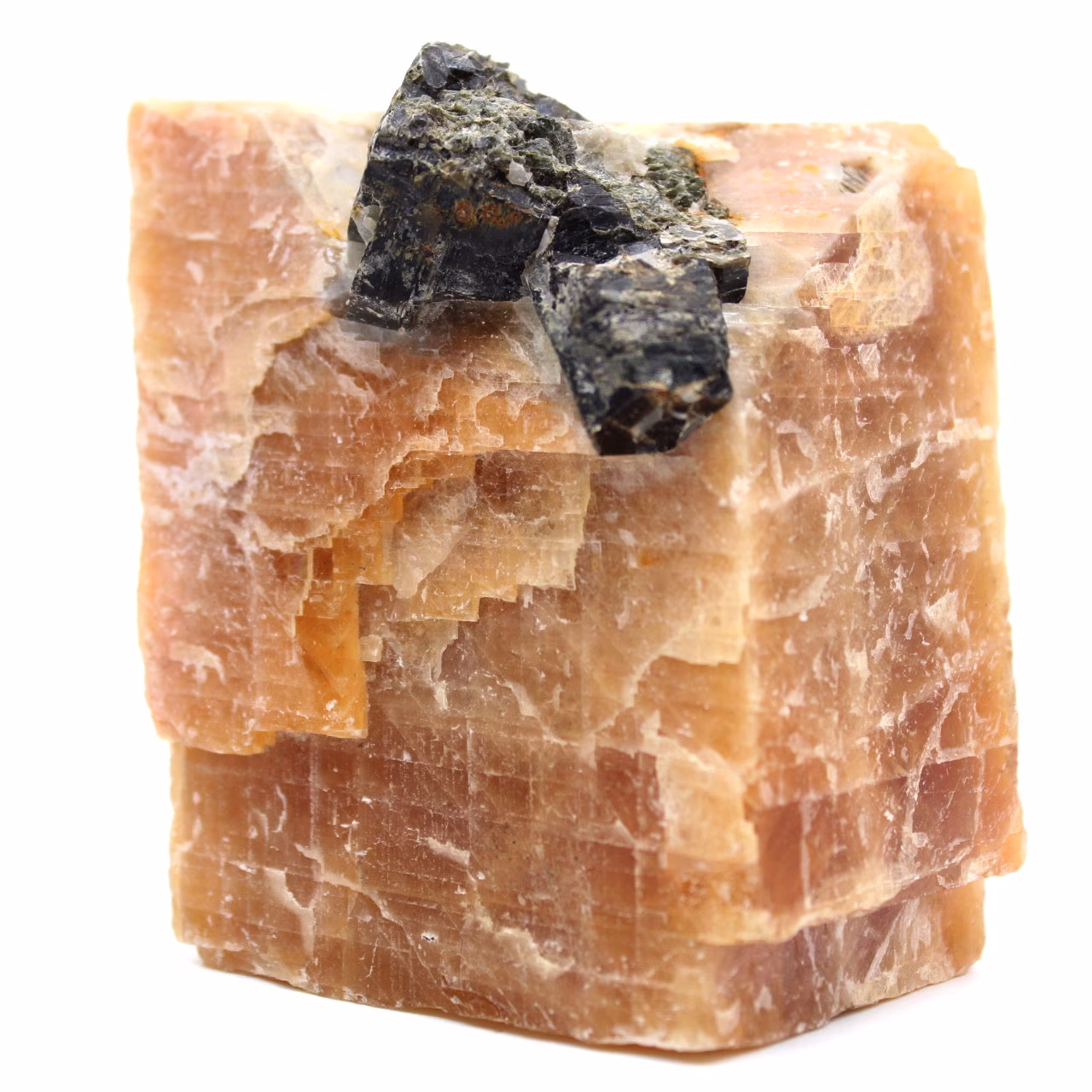 Cristalli di mica nera su blocco di calcite arancione